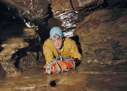 Crawl through shale band - Ogof Fechan